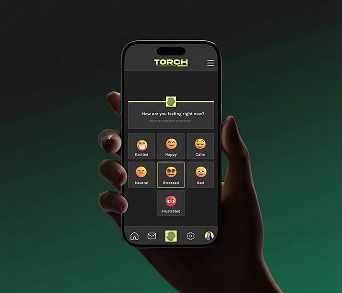 A hand holding a phone on a dark green background showing the TORCH check-in.